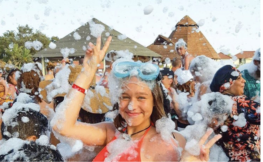Teen with goggles in foam
